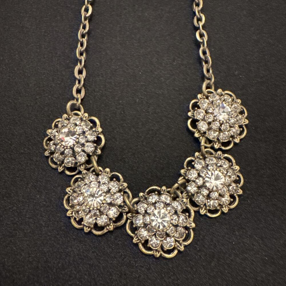 Lia Sophia rhinestone and brass tone necklace with round pendants 21”